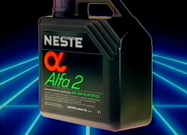A black four-litre Neste can, orange alpha and green Alfa 2, on the blue grid.